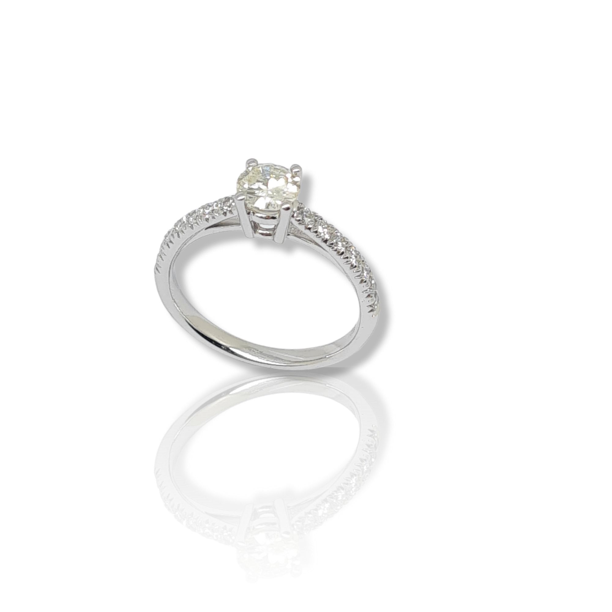 White gold single stone ring k18 with diamond on four teeth bezel and little diamonds on module (code T1913)